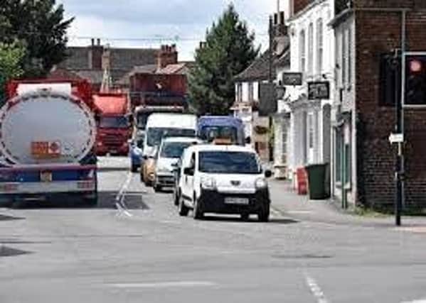 Wait for it: A typical snarl up at the junction of the A153 and A158 in Horncastle, but traffic experts say the new plans will not have a signifcant impact  on the volume of vehicles