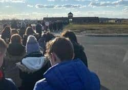 Charlie arriving at the entrance to Auschwitz Camp 2. EMN-200430-185800001