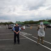 Soldiers of the 2nd Battalion The Royal Anglian Regiment (The Poachers) who have been testing at Tesco car park in Skegness, pictured with Coun Steve Walmsley.