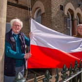 Horncastle’s Town and County Councillor Bill Aron (left) joins Simon Elmer to hoist the Polish flag at the town’s War Memorial Hospital Centre on Sunday.