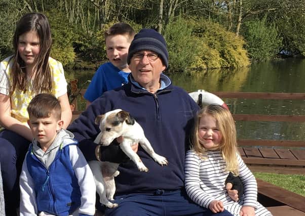 Mick Ashby - who turns 60 next week - with his grandchildren.