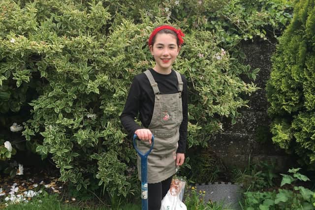 Izzy from The Biz in her landgirl outfit