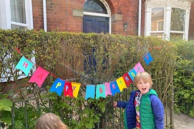 Birthday bunting on Heckington High Street for Oliver. EMN-200505-175803001