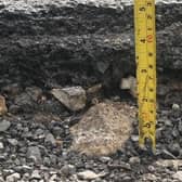 You can hear the bang as cars hit the pothole, say nearby homeowners.