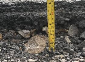 You can hear the bang as cars hit the pothole, say nearby homeowners.