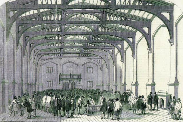 An old drawing of the interior of the Corn Exchange in its original use. EMN-200705-163853001