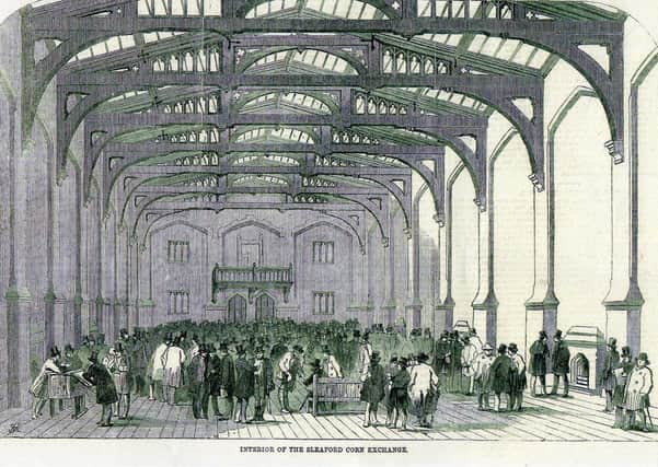 An old drawing of the interior of the Corn Exchange in its original use. EMN-200705-163853001