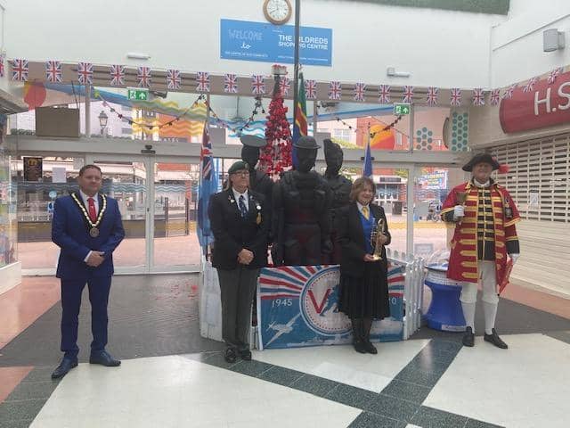 A small group met by the statue of Thre Fallen Three at the Hildreds Centre in Skegness this morning for the Town Crier's proclamation.