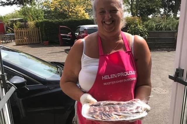 Helen Proudley delivering afternoon tea to Wainfleet Care Home carers.