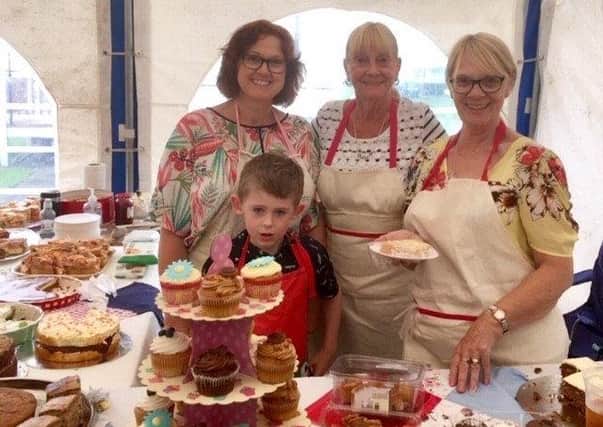The cake stall at an Anderby Creek Community Charity event last year.