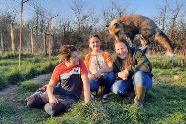 Members of the Mintram family and one of The Ark's animals.