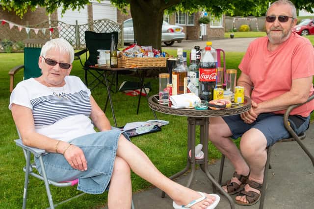 More Hemingby celebrated with an outdoor picnic - at a safe distance from others. EMN-201105-100045001