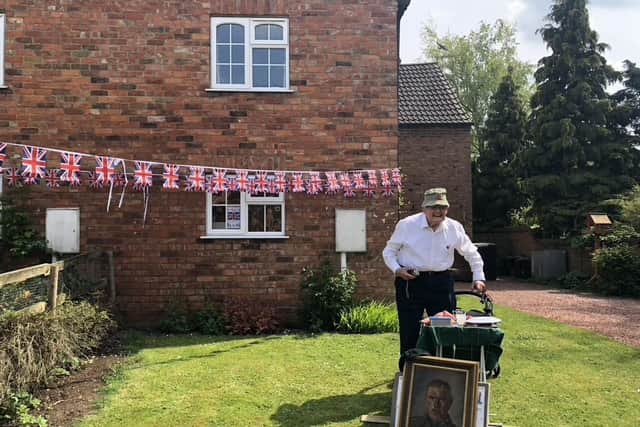 Retired Colonel Tim Beath who kicked off the villages rolling toast that started at New End and ended at The Coach & Horses 20 minutes later having been passed from garden party to garden party. Picture: Richard Jones. EMN-201105-100547001