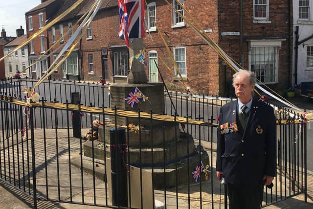 Victor Brocklesby wears his father’s war medals with pride as he is remembered on the 75th anniversary of VE Day at Caistor War Memorial. Picture by Peter Thompson