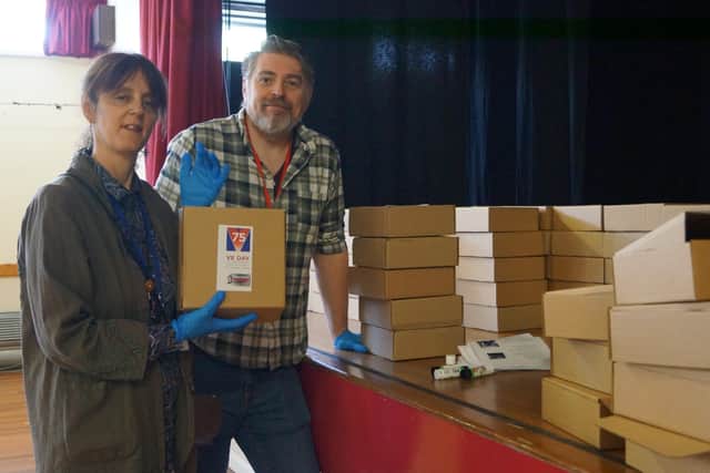 De Aston's Paul and Stella Williams were on box making duty EMN-201105-075036001