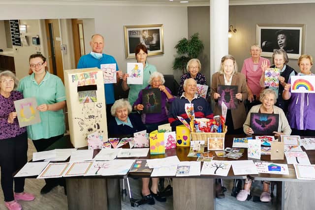 Staff and residents at Holdingham Grange care home thrilled with the cards and pictures from children. EMN-200514-110427001