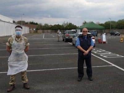 Soldiers of the 2nd Battalion The Royal Anglian Regiment (The Poachers) who have been testing at Tesco car park in Skegness, pictured with Coun Steve Walmsley. Copyright: jpimedia