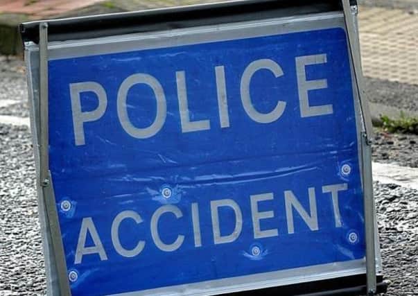 Road closed due to collision.