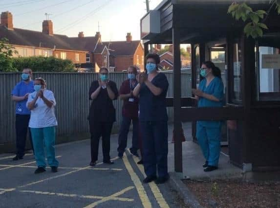 NHS frontline workers saying thank you for their scrubs at the Clap for Carers.