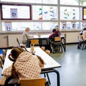 Preschool children sit in a classroom in The Hague, on May 11, 2020 as primary schools, playgroups and childcare reopen amid the pandemic of the novel coronavirus (COVID-19). - To prevent the spread of the coronavirus, all schools were closed for almost two months. (Photo by Sem VAN DER WAL / ANP / AFP) / Netherlands OUT (Photo by SEM VAN DER WAL/ANP/AFP via Getty Images) SUS-201105-154746001