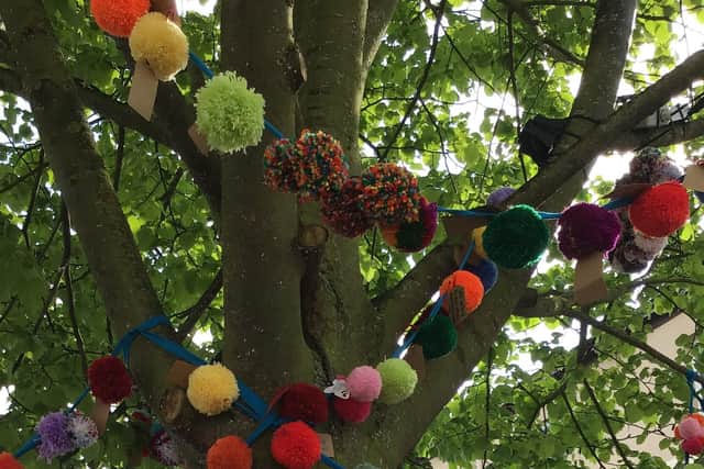 The community-made pom pom tree in Alford.