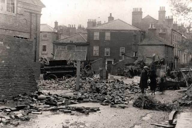 Enginegate (now Broadbank) with the girl’s school in the background on the left. The damaged wall in the foreground (left) was the wall of the fire engine shed. (Photo: Louth Museum)