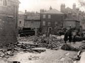 Enginegate (now Broadbank) with the girl’s school in the background on the left. The damaged wall in the foreground (left) was the wall of the fire engine shed. (Photo: Louth Museum)