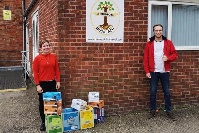 Dominic Solesbury, of the White Hart Hotel, Boston, is pictured handing over the surplus supplies to Centrepoint Outreach’s Kelly Reay.