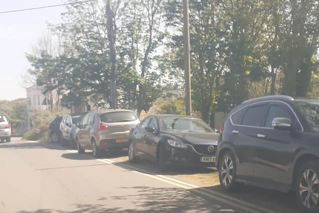 Cars parked in Anderby Creek village were stopping people from leaving their homes.