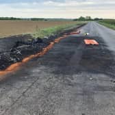 The fire damaged section of road on the A153 near Anwick. EMN-200522-122703001