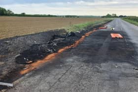The fire damaged section of road on the A153 near Anwick. EMN-200522-122703001