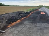 The fire damaged section of road on the A153 near Anwick. EMN-200522-122703001