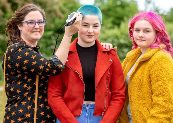 Pictured from left are Amy Cullen and her daughters Kiera (centre) and Poppy (right).