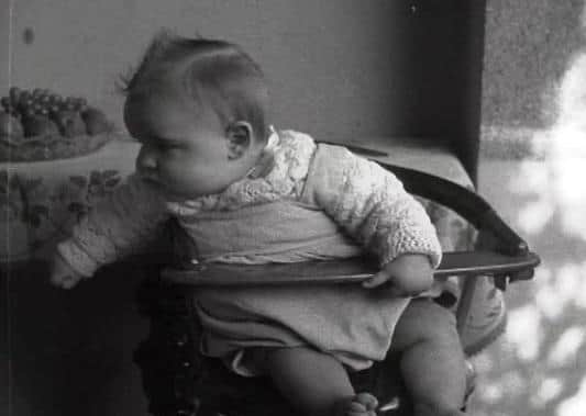 Fifteen-month old Patricia Russell was saved from the flood.