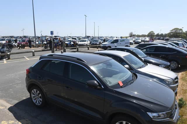 Vehicles filling the foreshore car park in Skegness.