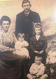 Margaret Bromfield (left) and her eldest daughter Clara both passed away. Pictured with their family in 1911.