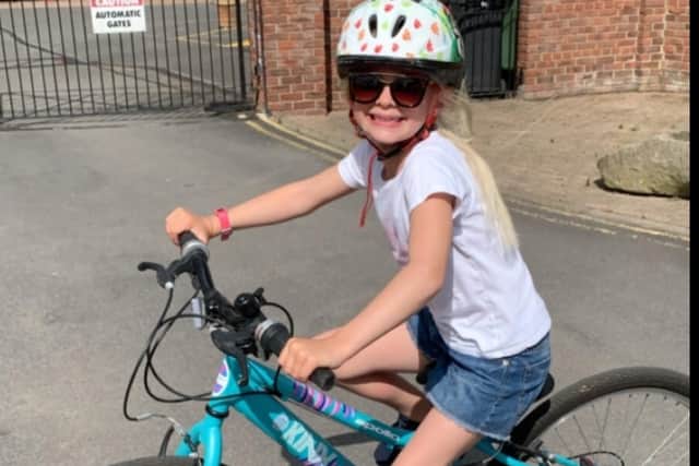 Bella raised 660 after challenging herself to complete 100 miles