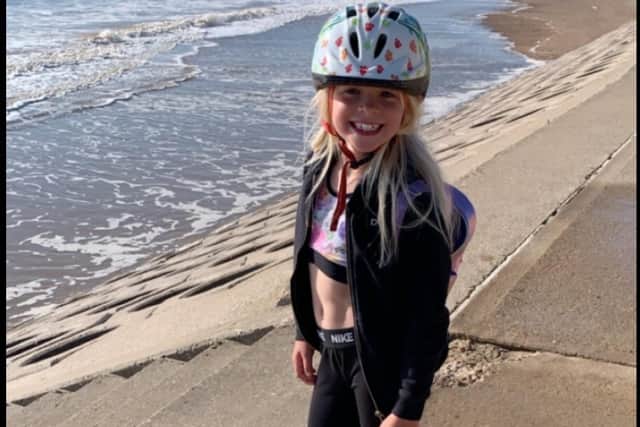 Bella raised 660 after challenging herself to complete 100 miles