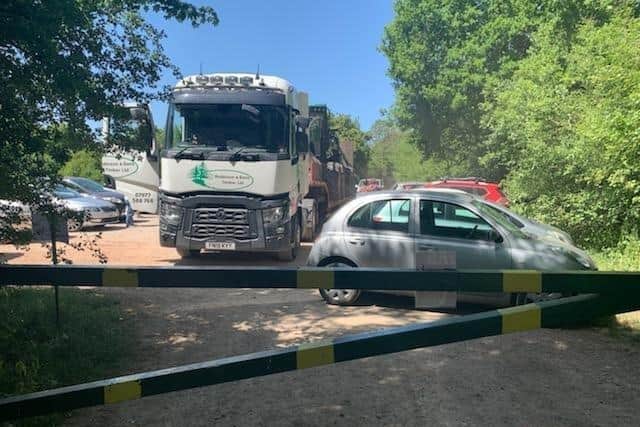 The car park at Chambers Farm Wood has been closed after people parked in front of gates and moved cones to park their vehicles, meaning that the Forestry England vehicles were unable to access the site. Credit: Forestry England. EMN-200529-165833001