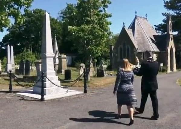 The Mayor and Mayoress approaching the Louth Flood Memorial earlier today.