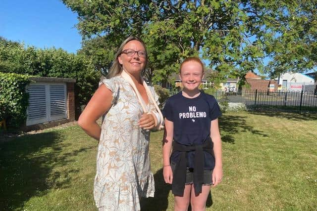 Jo Stokes and daughter Ellie, 11, arriving at school.