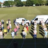 Skegness Sewers for the NHS gathered for a presentation of 1,000 to  make scrubs. Photo: Barry Robinson.