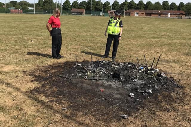 Police at the scene of the 'arson' incident.