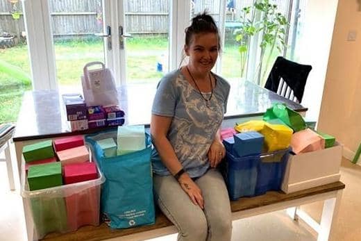 Midwifery student Kayleigh Sherwin of Greylees with some of the sanitary packages she has collected for Action Aid. EMN-200806-155917001