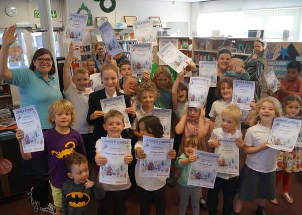 Children enjoying the finale of last year’s Summer Reading Challenge EMN-200406-084420001