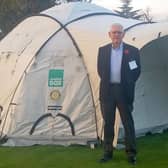 Speaker Ian Wilson with one of the ShelterBox tents