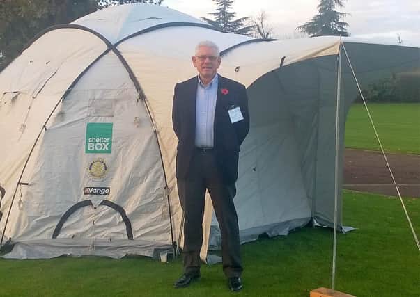 Speaker Ian Wilson with one of the ShelterBox tents
