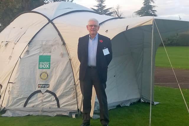 Speaker Ian Wilson with one of the ShelterBox tents