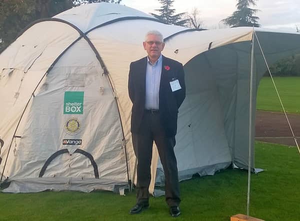 Speaker Ian Wilson with one of the ShelterBox tents