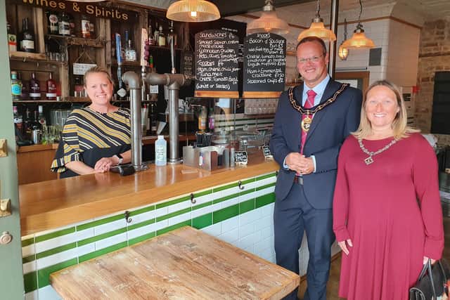 The Mayor and Mayoress with Rachel Wright at The Auction House in the Cornmarket.